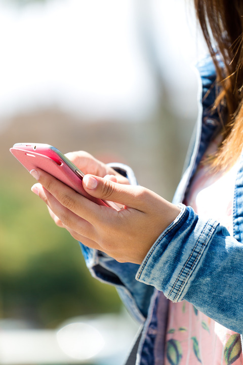 woman checking phone