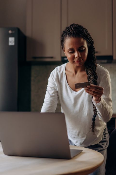 woman-holding-a-card