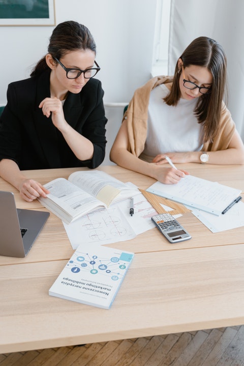 women at coffee desk