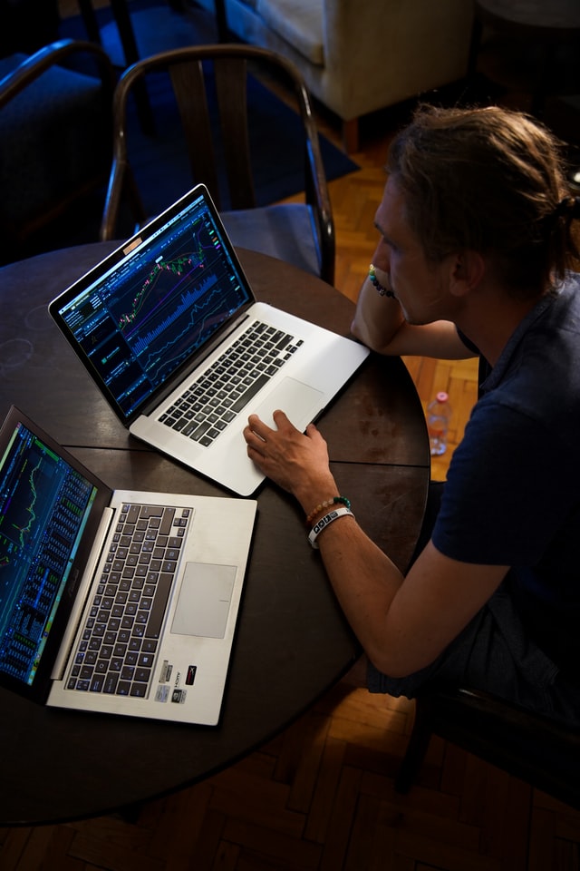 Man with Two Laptops